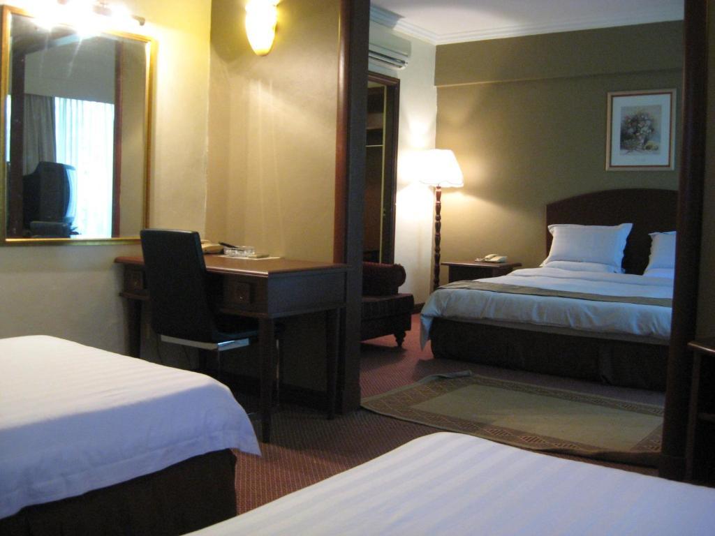Casuarina Hotel Kota Kinabalu Pokoj fotografie