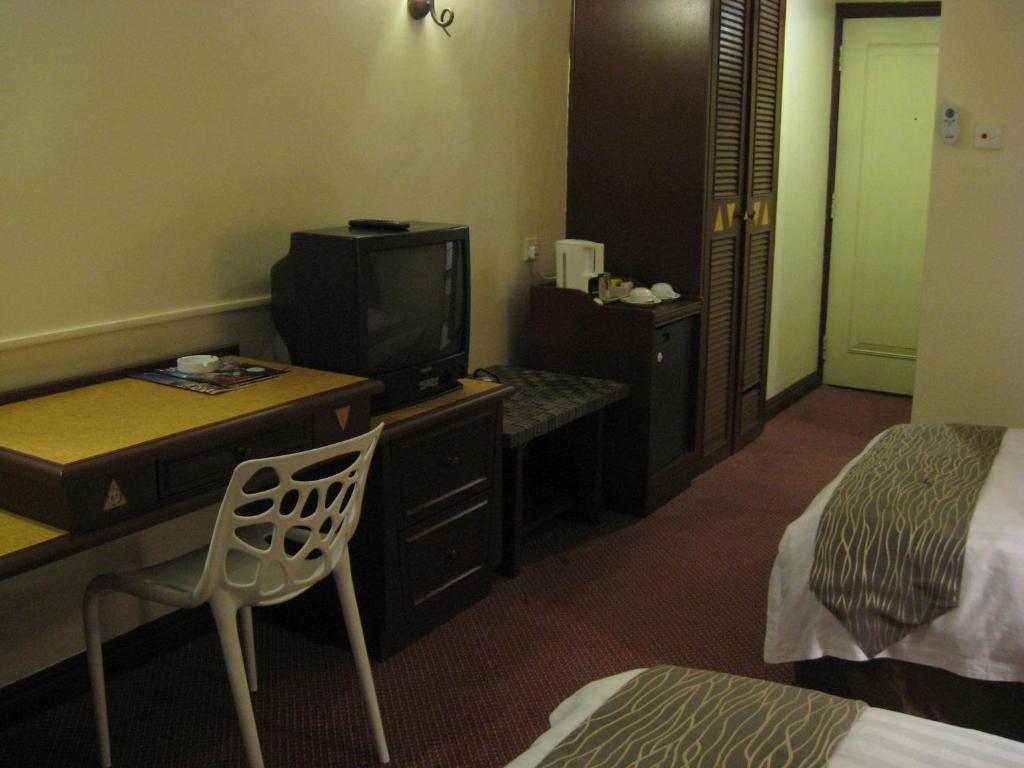 Casuarina Hotel Kota Kinabalu Pokoj fotografie